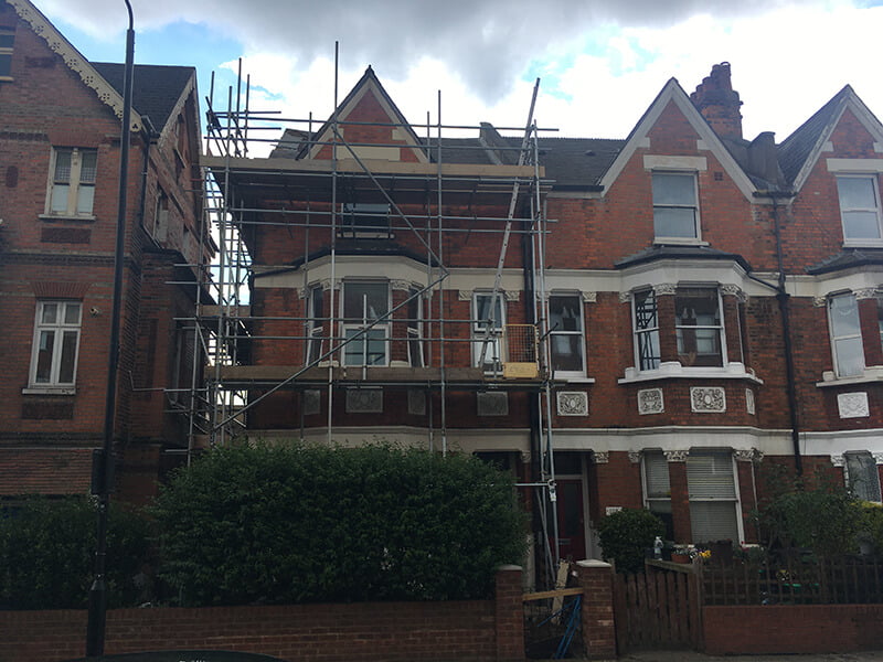 Residential scaffold in front of house