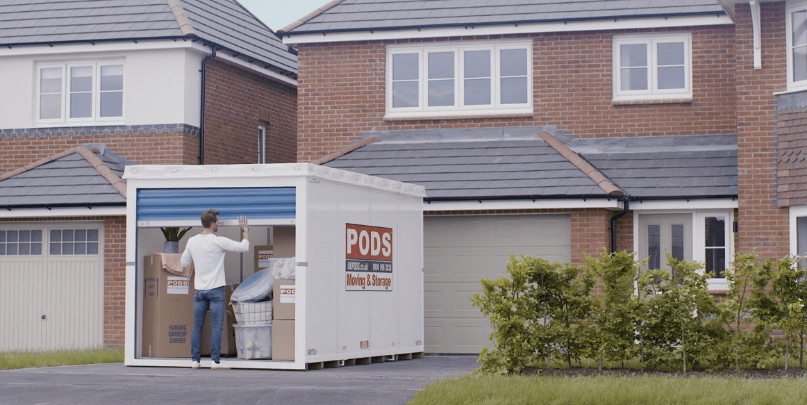 Man loading a PODS container