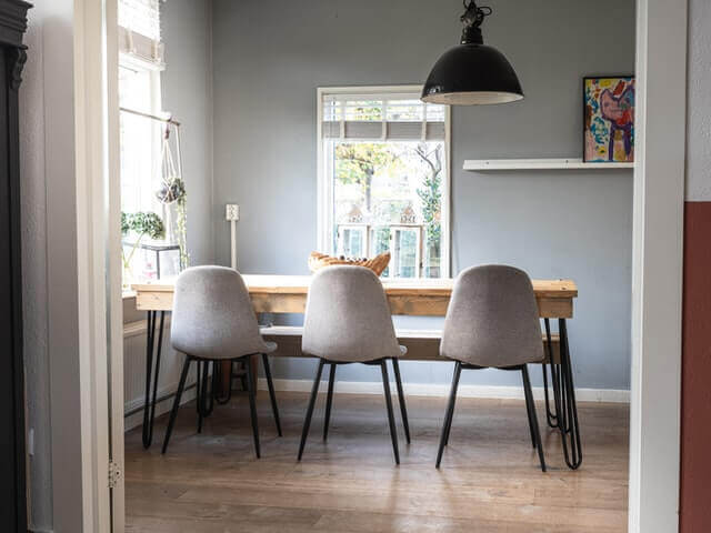 dining room with chairs, table and vinyl flooring
