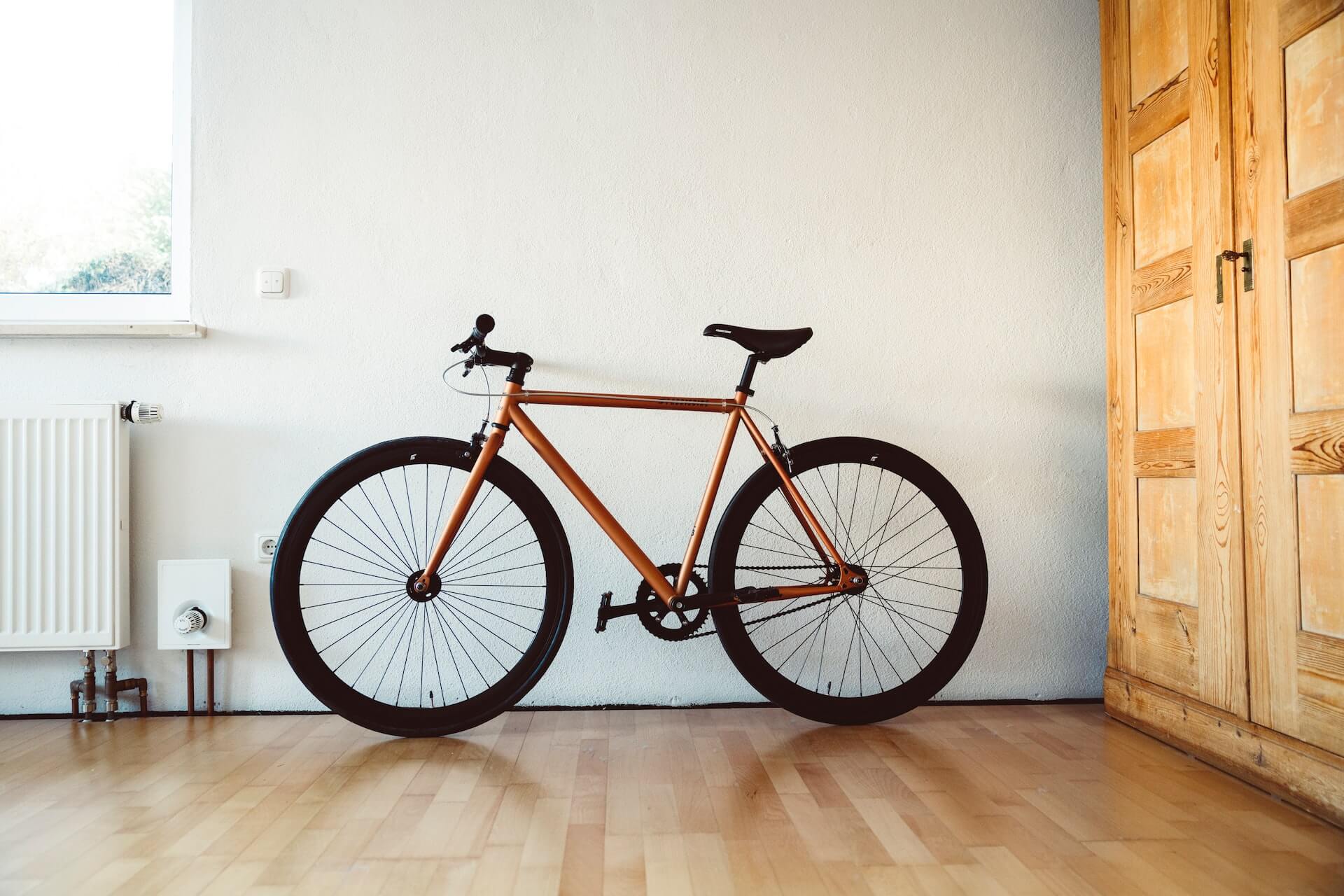 Bike on a brown wooden floor