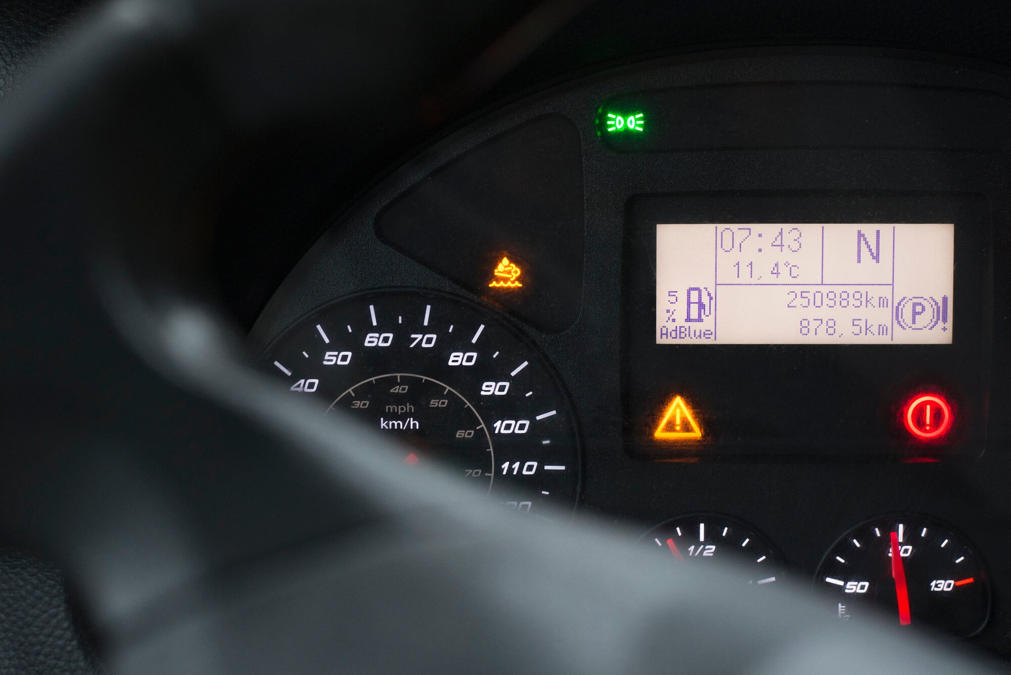 AdBlue warning light on car dashboard