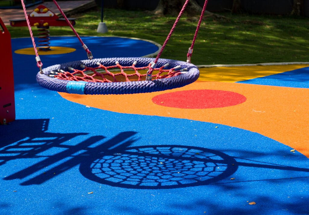 Mix of Blue and Orange rubber  mulch play area