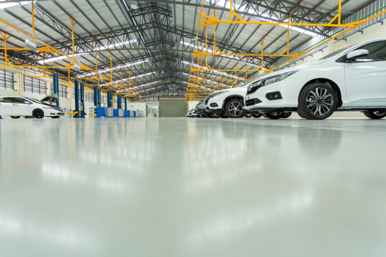 Grey poured rubber flooring for a UK Large Garage